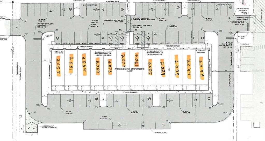 This is a site plan rendering for a proposed retail strip building with surrounding parking — 2055 S 30TH STREET, HAINES CITY, FL