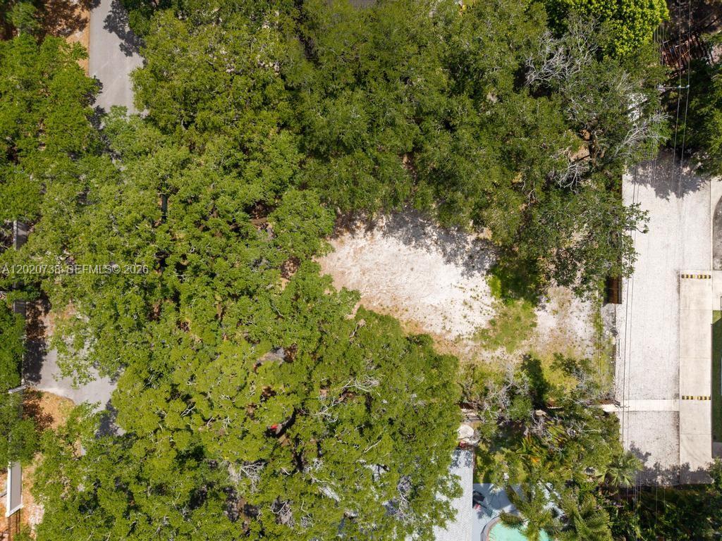 An aerial view shows a vacant, sandy lot surrounded by mature trees — 5941 SW 36th Ter, Dania Beach FL 33312, DANIA BEACH, FL