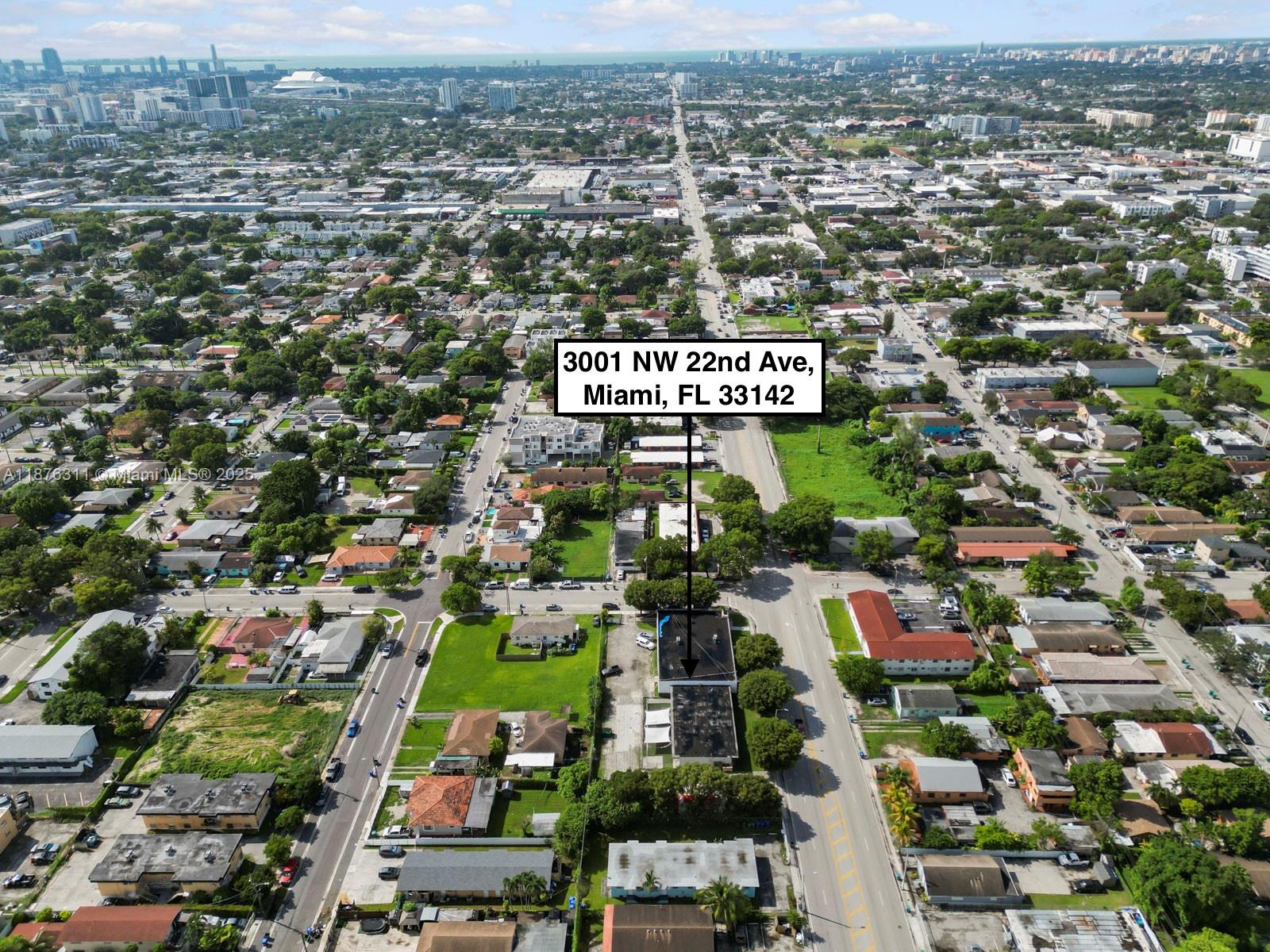 An aerial view shows a commercial building situated on a corner lot in Miami — 3001 NW 22nd Ave, Miami FL 33142, MIAMI, FL