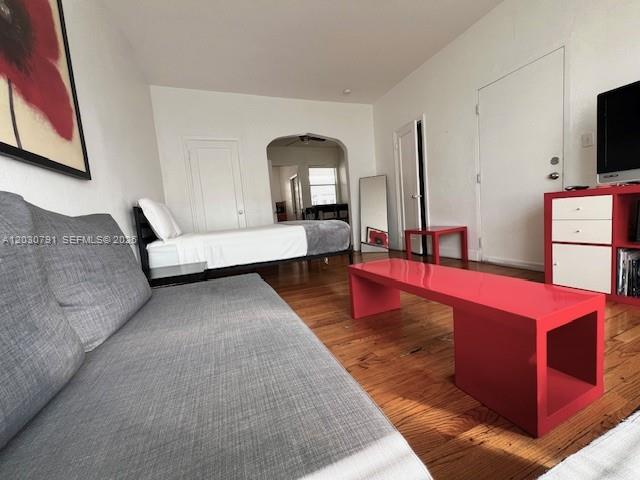 A room features a gray sofa, a bed, and a bright red coffee table — 601 7th St # 4, Miami Beach FL 33139, MIAMI BEACH, FL