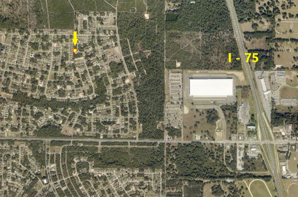 This is an aerial map view showing a residential neighborhood located west of I-75 — SW 128TH STREET ROAD, OCALA, FL