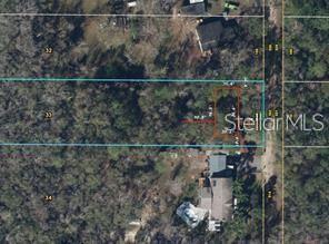 This is an aerial map showing a rectangular property lot outlined in blue — 522 HAMILTON DRIVE, ORLANDO, FL