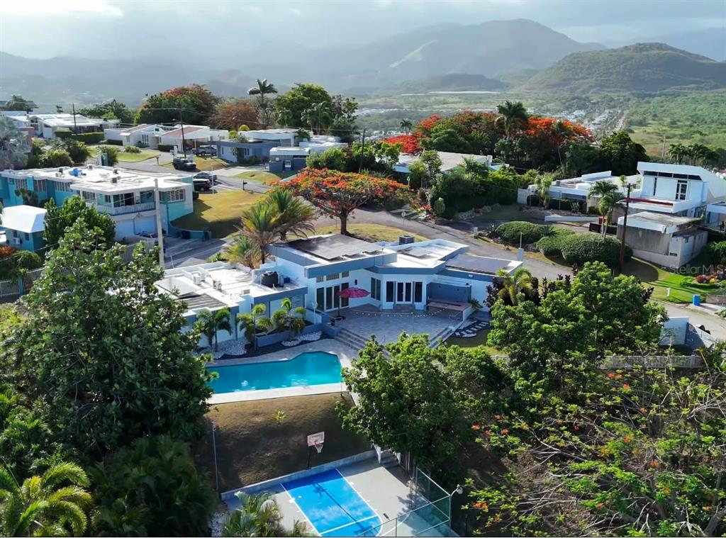 An aerial view of a house with a swimming pool and a basketball court — 3505 LA SANTA EL MONTE, PONCE, PR