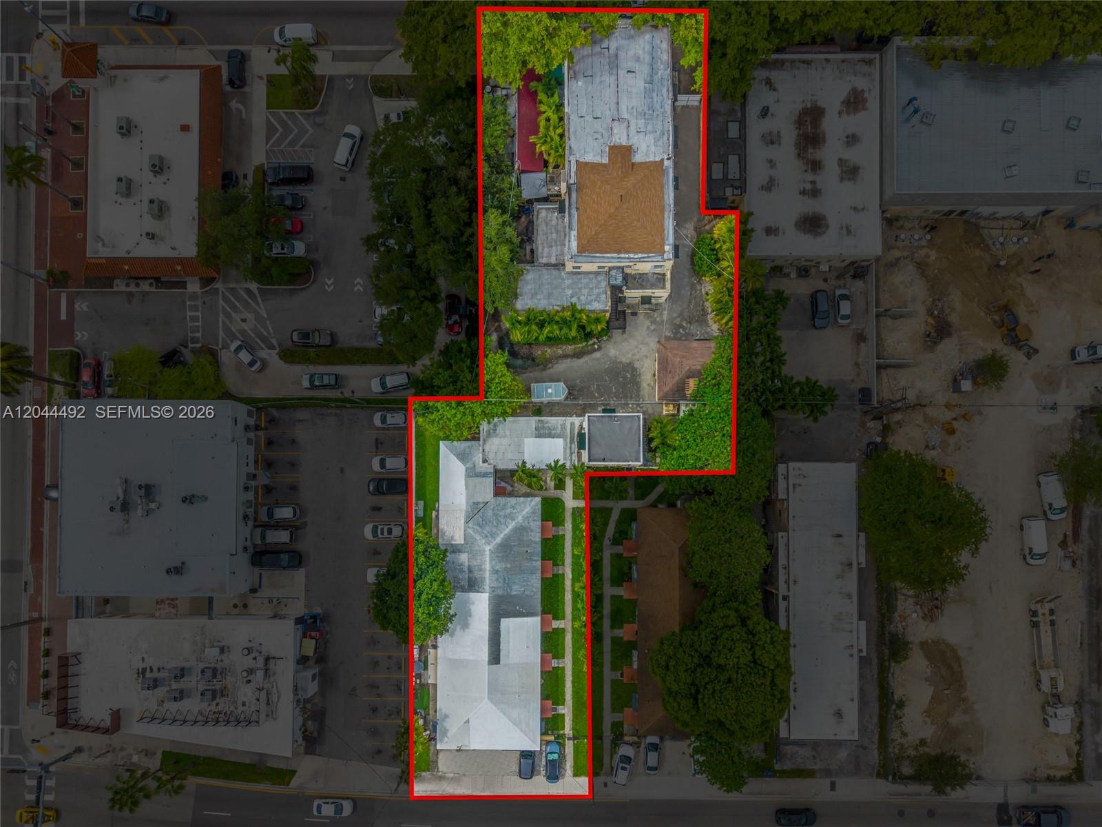 An aerial view shows two adjacent properties outlined in red within an urban setting — 1731 SW 8th St, Miami FL 33135, MIAMI, FL