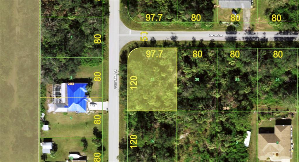 This is a map showing a vacant corner lot highlighted in yellow — 12023 LEROY AVENUE, PORT CHARLOTTE, FL