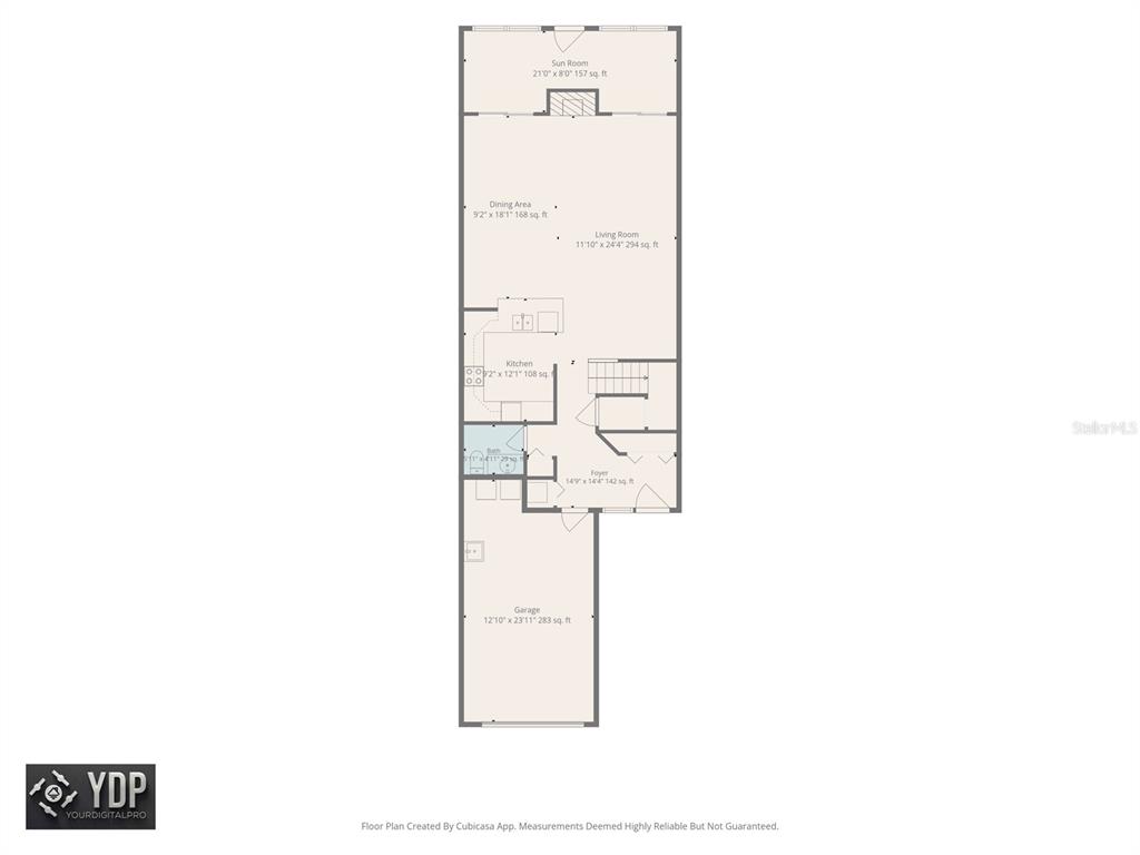 This is a floor plan of a single-story home featuring a garage, kitchen, and sunroom — 9150 PARK BOULEVARD UNIT 6, SEMINOLE, FL
