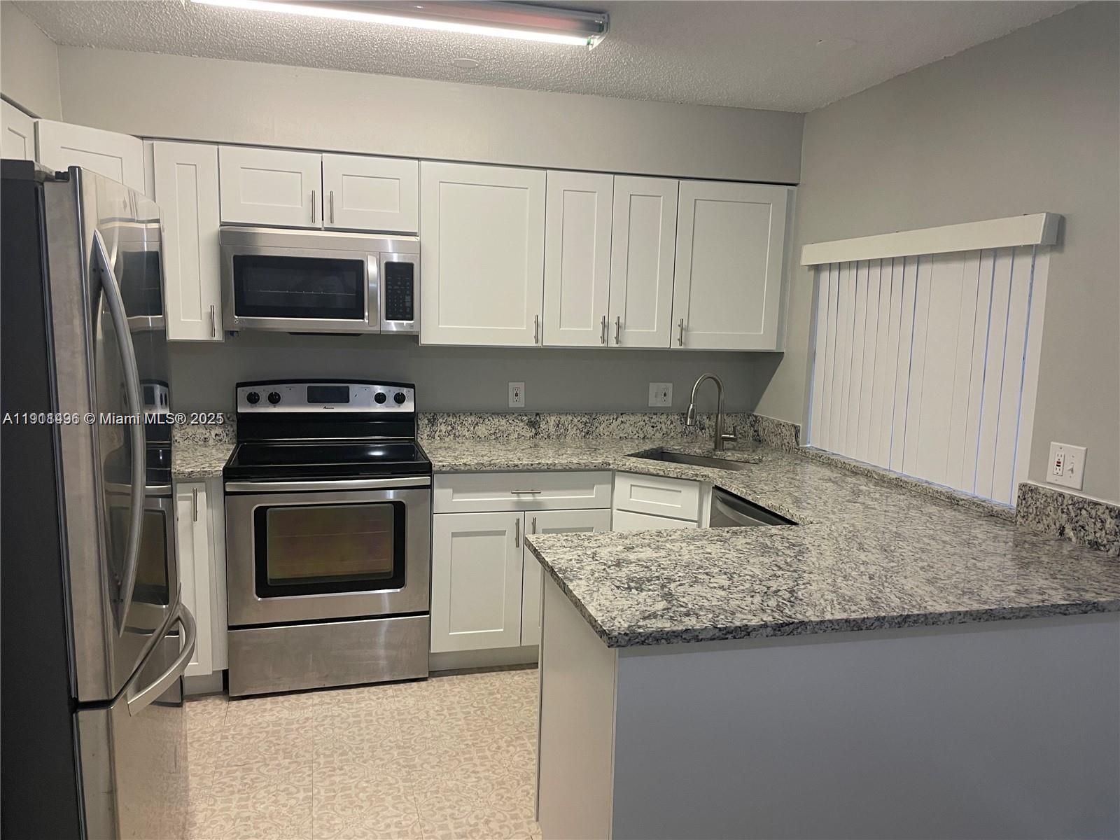 4513 Treehouse Ln # 11C, Tamarac FL 33319