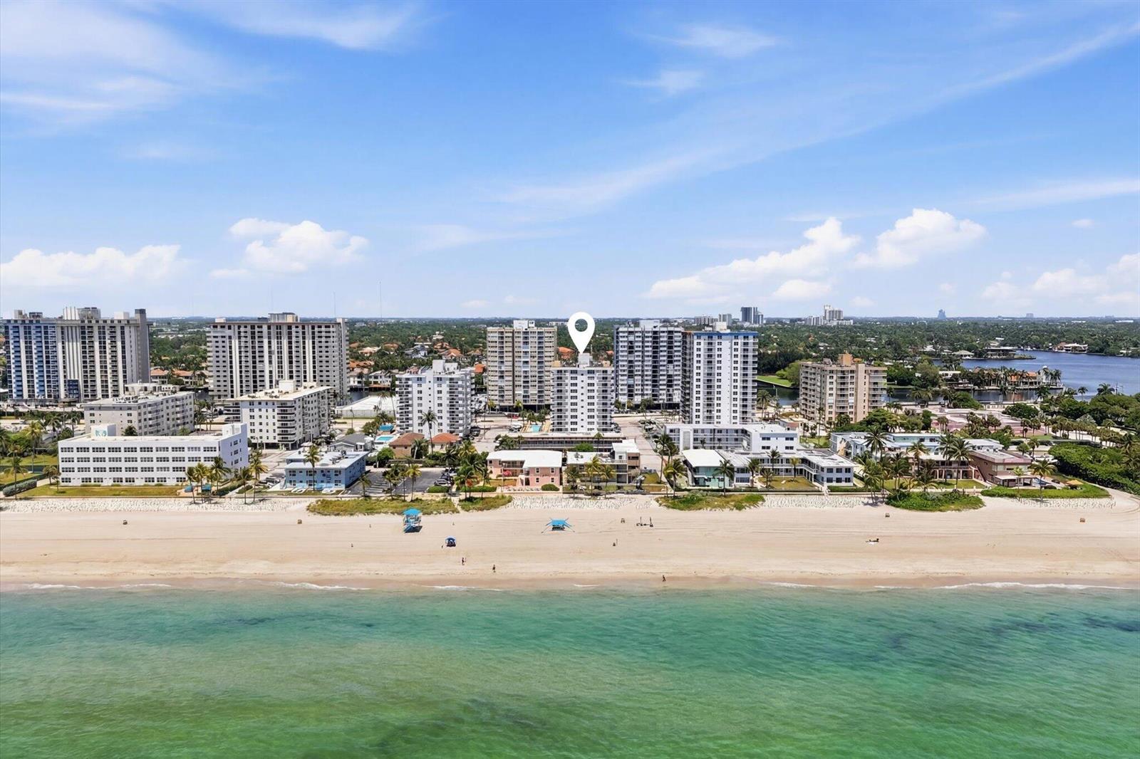 An aerial view shows a beach with high-rise buildings and a location pin marker — 1601 S Ocean Drive # 506, Hollywood FL 33019, HOLLYWOOD, FL