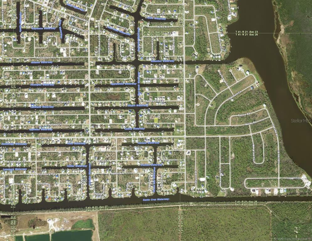 This is an aerial map showing a residential neighborhood with numerous canals and streets — 15723 STUART CIRCLE, PORT CHARLOTTE, FL
