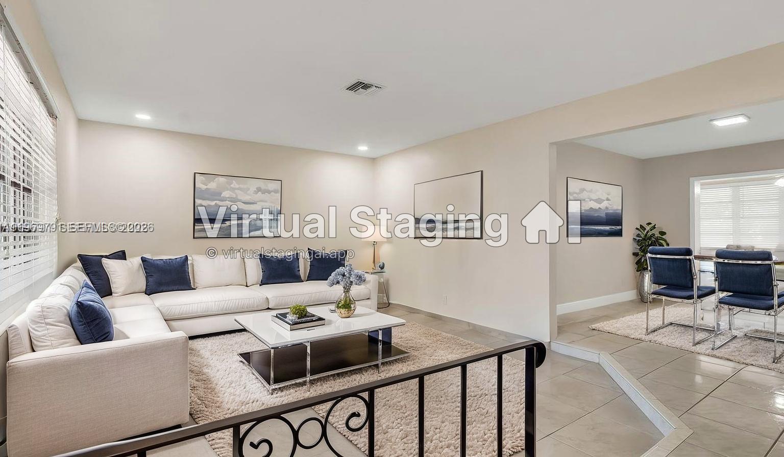 This living room features a white sectional sofa, a coffee table, and an adjacent dining area — 5300 Grant St, Hollywood FL 33021, HOLLYWOOD, FL