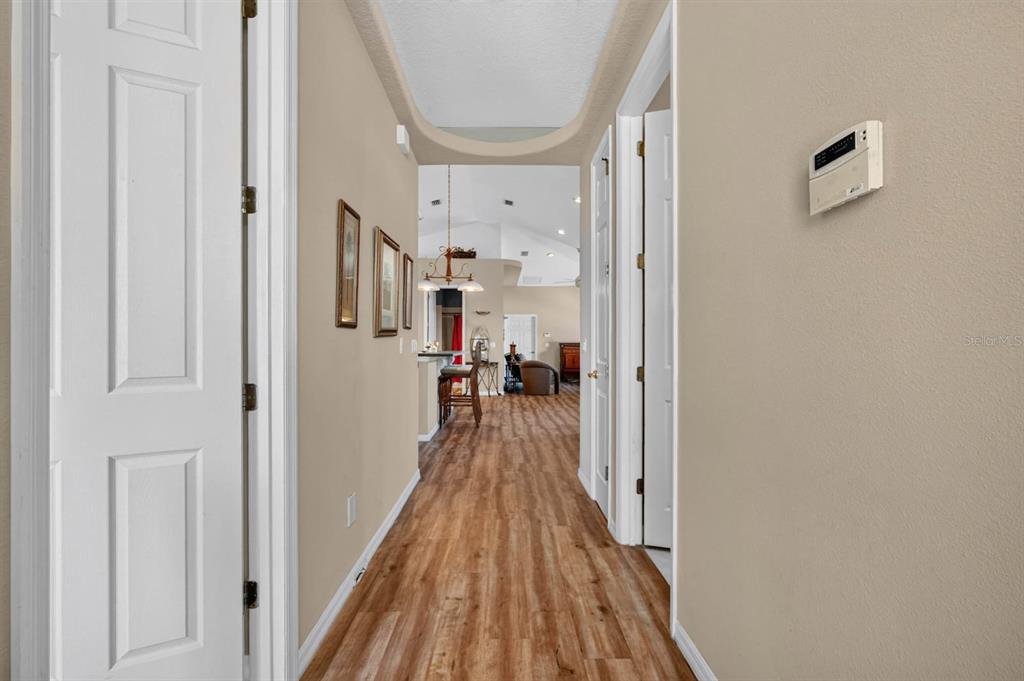 This is a floor plan of a single-story house with a garage and three bedrooms — 497 GRANDVIEW AVENUE, ORMOND BEACH, FL