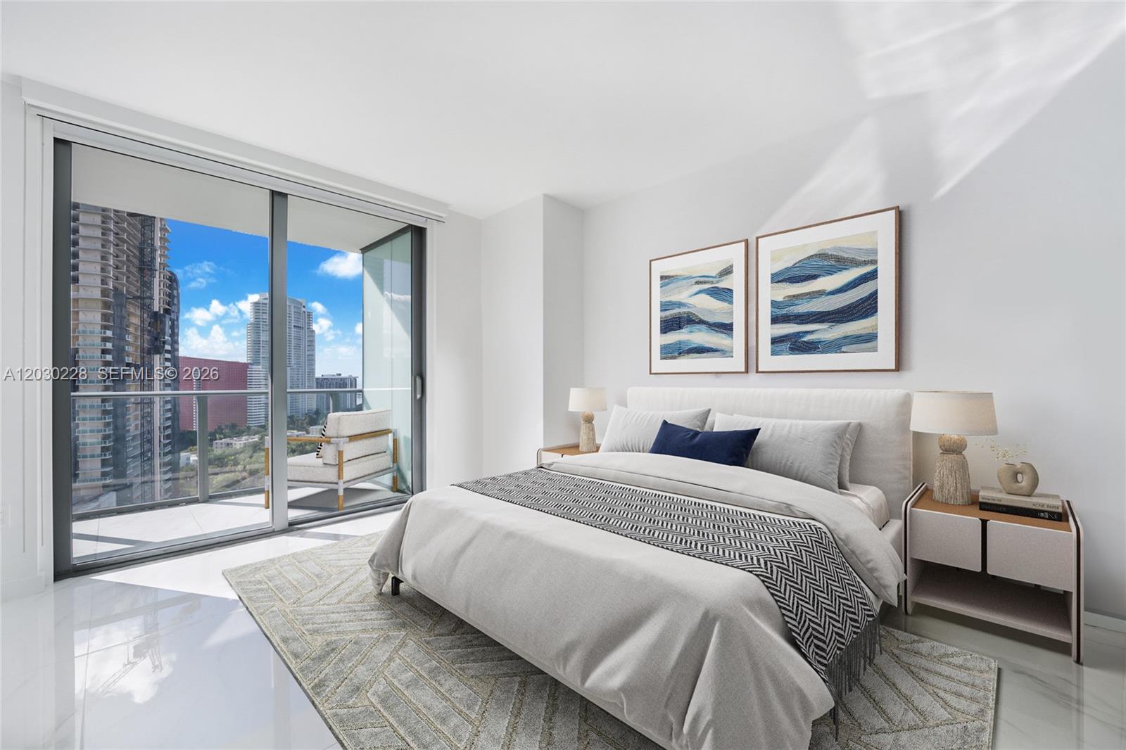 A modern bedroom features a queen bed, two nightstands, and a balcony with city views — 1300 S Miami Ave # 1705, Miami FL 33130, MIAMI, FL