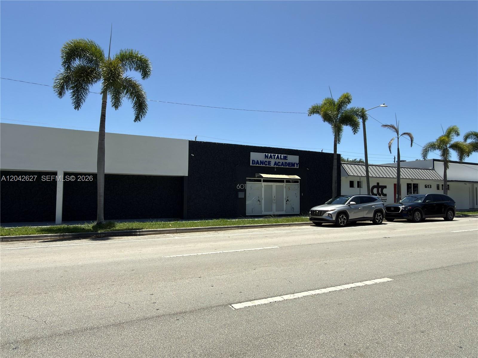 A street-level view shows a commercial building with a dance academy sign and parked cars — 601 N 21st Ave, Hollywood FL 33020, HOLLYWOOD, FL