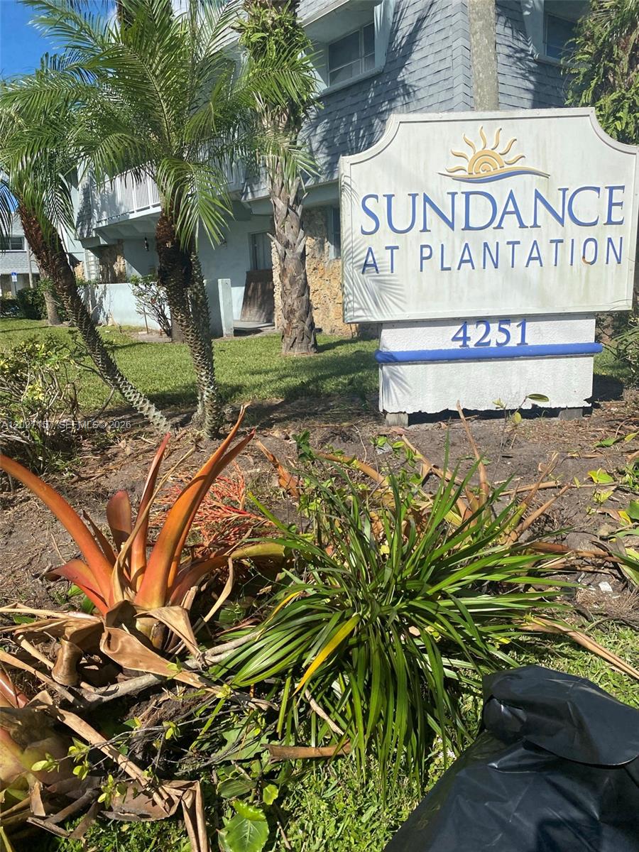 The exterior sign for Sundance at Plantation stands in front of a multi-story apartment building — 4271 NW 5th St # 117, Plantation FL 33317, PLANTATION, FL