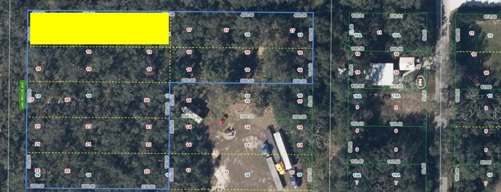 This is an aerial map showing several rectangular land parcels with lot numbers and dimensions — 6101 OAK RIDGE AVENUE LOT 18, SEBRING, FL