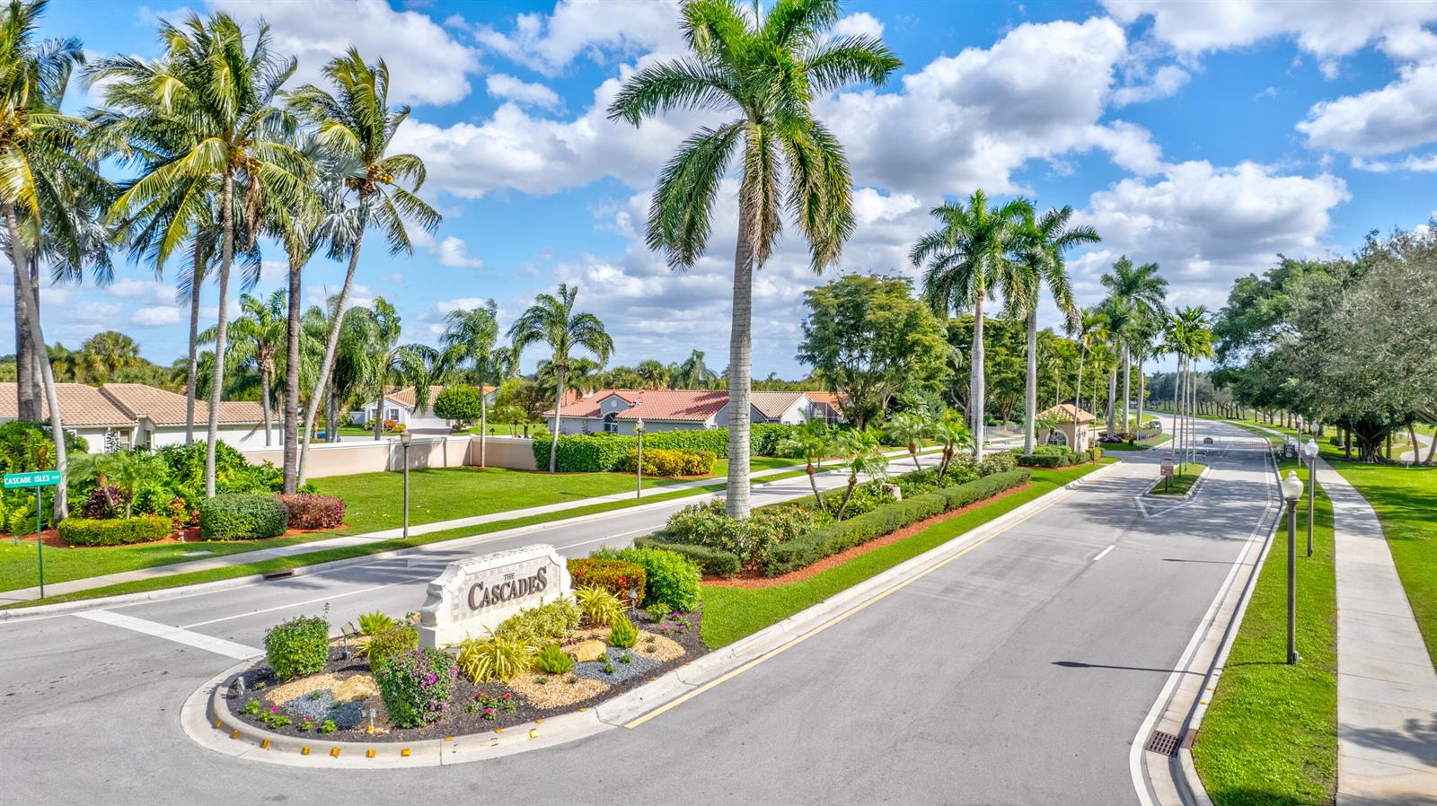 An exterior view shows the entrance to a residential community with palm trees and landscaping — 6715 Chimere Terrace, Boynton Beach FL 33437, BOYNTON BEACH, FL