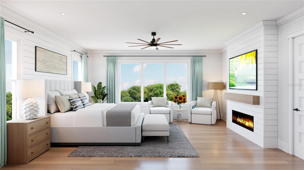 This rendering of a bedroom features a fireplace, a television, and a seating area — 705 W PARK AVENUE, TAMPA, FL