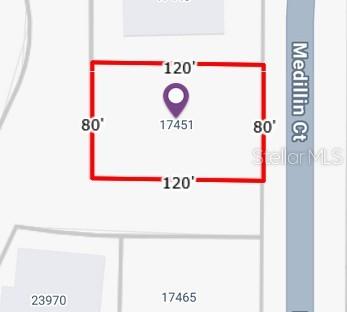 This is a map showing the rectangular property boundaries and dimensions of a vacant lot — 17451 MEDILLIN COURT, PUNTA GORDA, FL