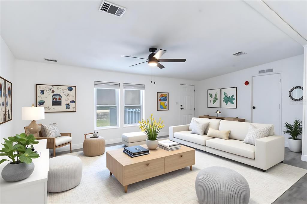 This is a rendering of a bright living room featuring a white sofa and coffee table — 2140 TRAILSWOOD PATH, LAKELAND, FL