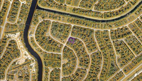 An aerial map view shows a highlighted residential lot within a suburban neighborhood — NOME AVENUE, NORTH PORT, FL