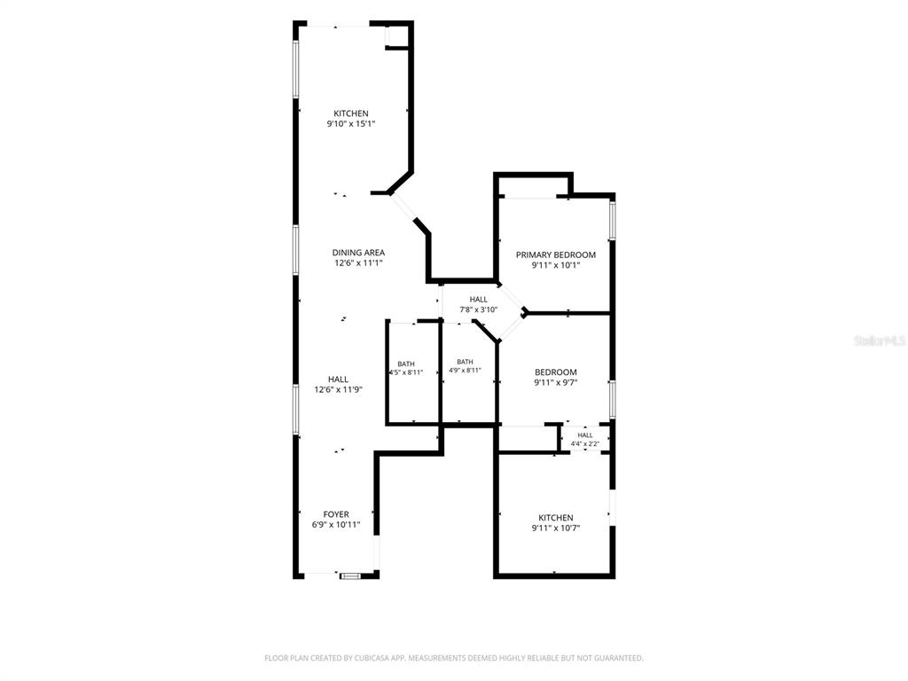 An entryway features white tile flooring, a green accent wall, and a white front door — 9616 HOLLYHILL DRIVE, ORLANDO, FL