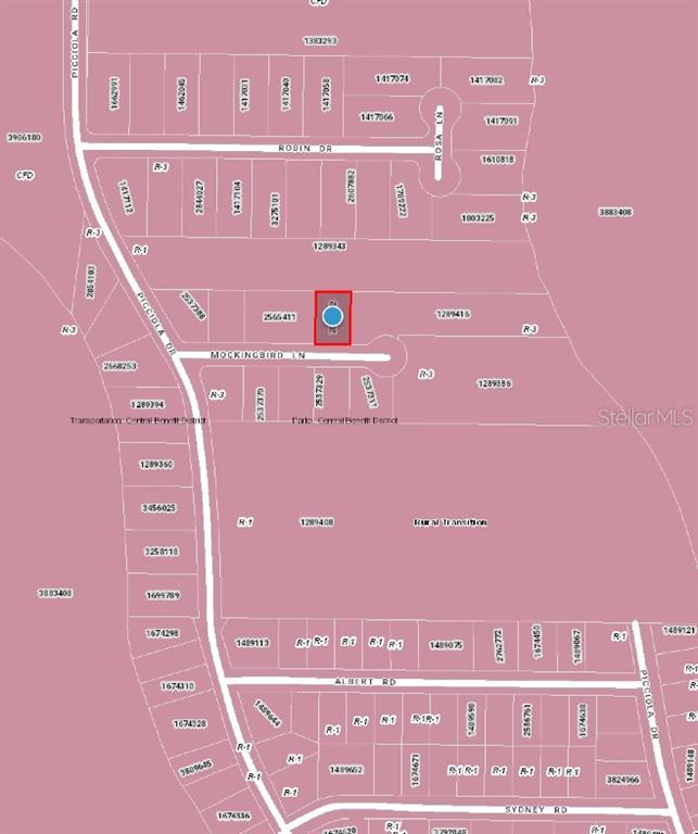 This is a plat map showing property lines and parcel numbers for a residential area — MOCKINGBIRD LANE, FRUITLAND PARK, FL