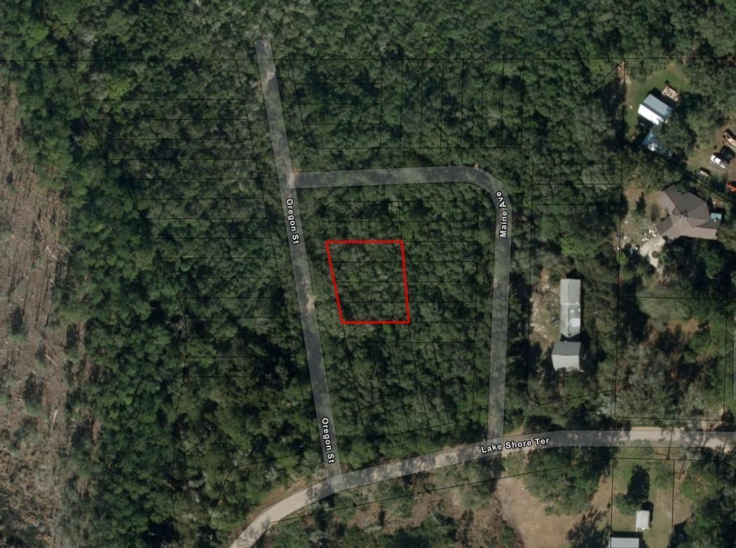 An aerial map shows a rectangular plot of land outlined in red near local streets — 0 Oregon Street, FL 32148, FL