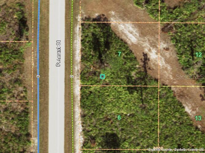 This is an aerial map showing two adjacent vacant lots labeled 6 and 7 — 13 PENNANT COURT, PLACIDA, FL
