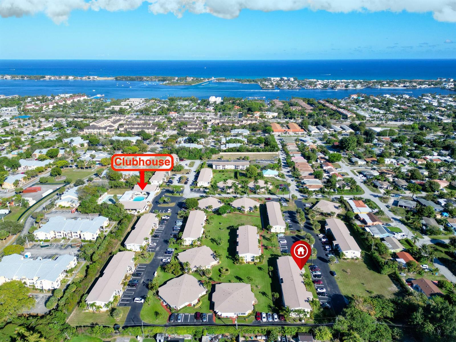 An aerial view shows a residential complex with a clubhouse, pool, and multiple apartment buildings — 301 Circle Drive S # 103, Boynton Beach FL 33435, BOYNTON BEACH, FL