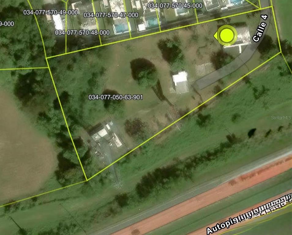 This is an aerial map showing a property parcel outlined in yellow — Carr 686 Km 0.2 CARR 686 KM 0.2 BO COTO NORTE SECTOR GUAYANEY, MANATI, PR