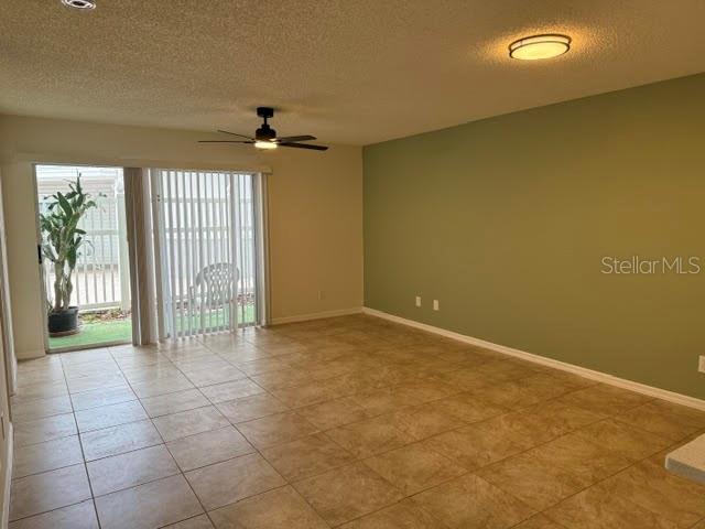 A paved walkway leads past a small tree and landscaping toward the entrance of a building — 6826 STONES THROW CIRCLE N UNIT 11101, ST PETERSBURG, FL