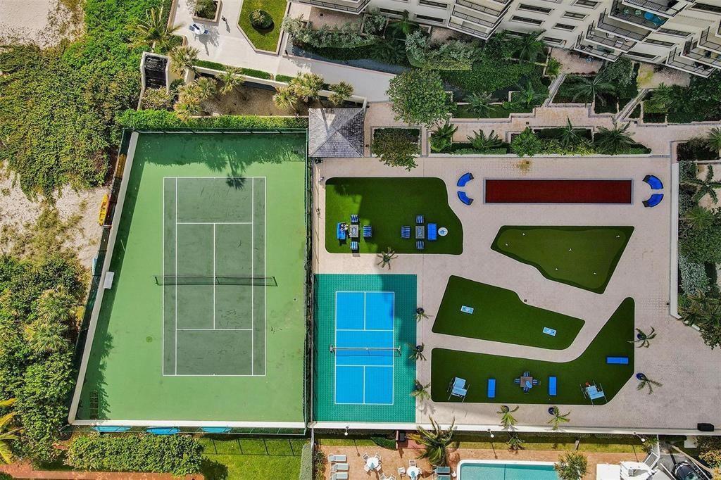 An aerial view shows a tennis court, a pickleball court, and a putting green area — 1800 S Ocean Boulevard # 403, Pompano Beach FL 33062, POMPANO BEACH, FL