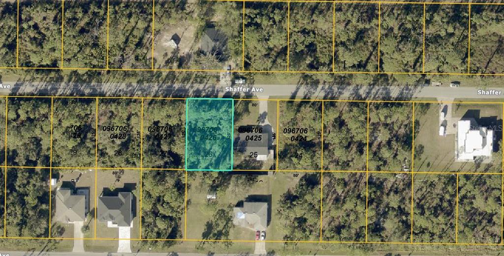 This is an aerial map showing a highlighted vacant lot among other residential properties — 0967060426 SHAFFER AVENUE, NORTH PORT, FL