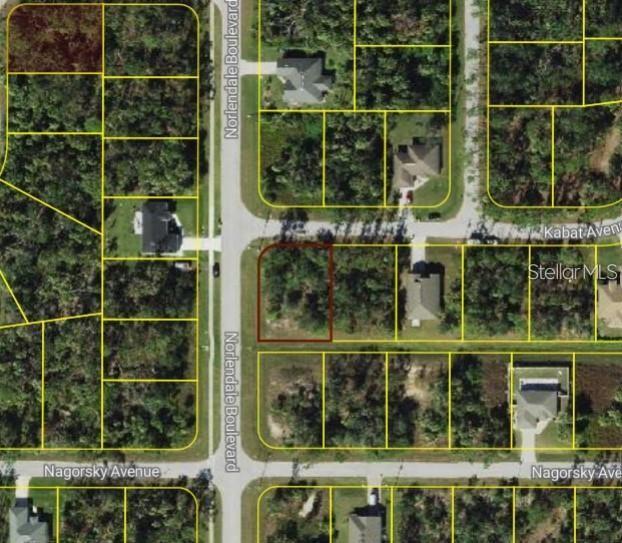 This is an aerial map view of a vacant residential lot outlined in red — KABAT AVENUE, NORTH PORT, FL
