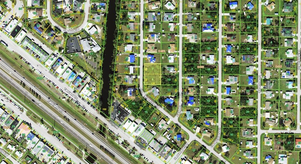 This is a satellite map view of a residential neighborhood with streets and property lines — 3648 BROOKLYN AVENUE, PORT CHARLOTTE, FL