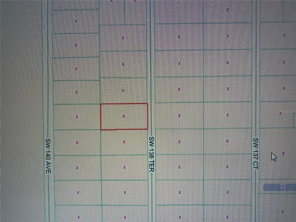 This is a plat map showing a highlighted rectangular parcel of land between two streets — SW 138TH TERRACE, DUNNELLON, FL