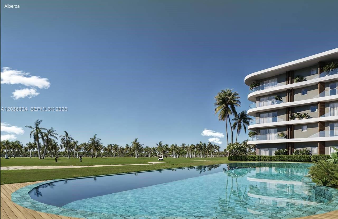 This rendering shows a modern apartment building exterior with balconies overlooking a swimming pool — 0 coral golf # 0, FL