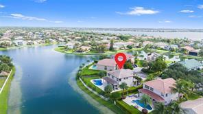 An aerial view of a waterfront suburban neighborhood featuring houses with private swimming pools — 5422 SW 185th Terrace, Miramar FL 33029, MIRAMAR, FL