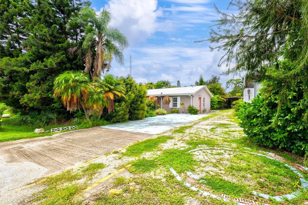 An aerial view shows a residential property highlighted by a black box in a neighborhood — 507 PINEWOOD AVENUE, NOKOMIS, FL