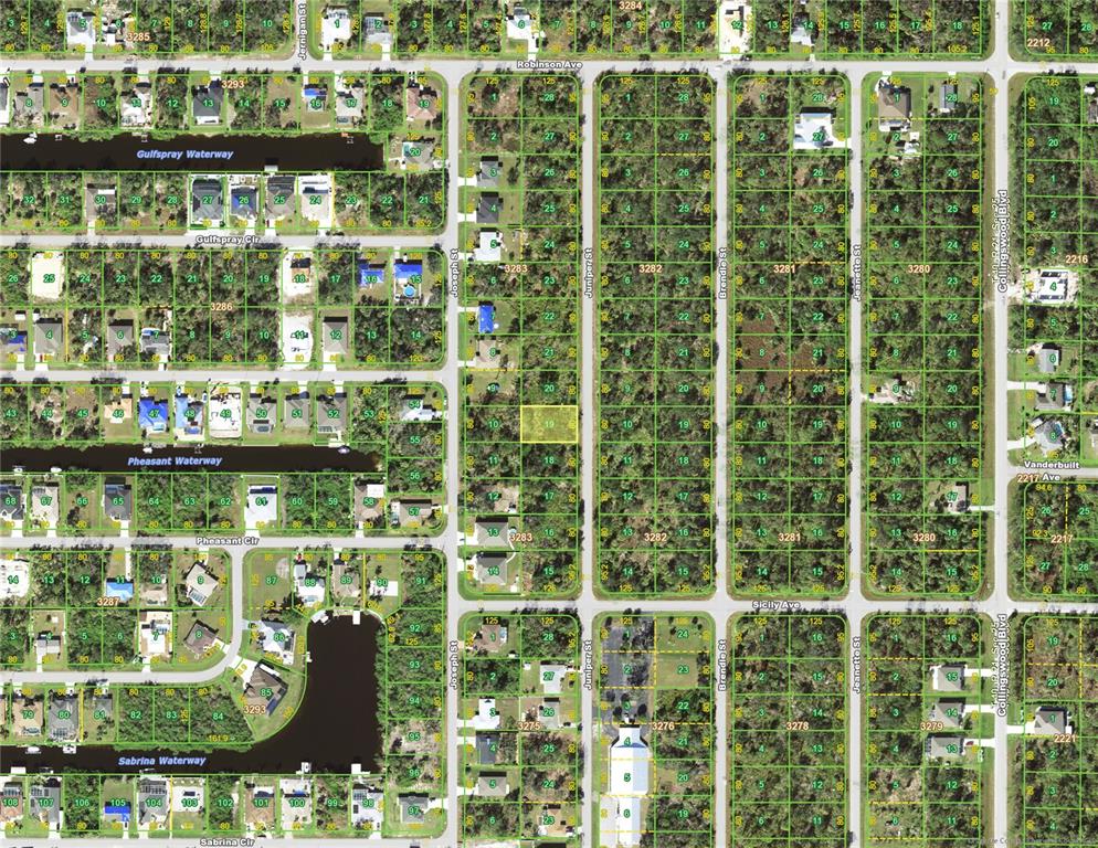 This is an aerial map showing residential lots and waterways in a suburban neighborhood — 4113 JUNIPER STREET, PORT CHARLOTTE, FL