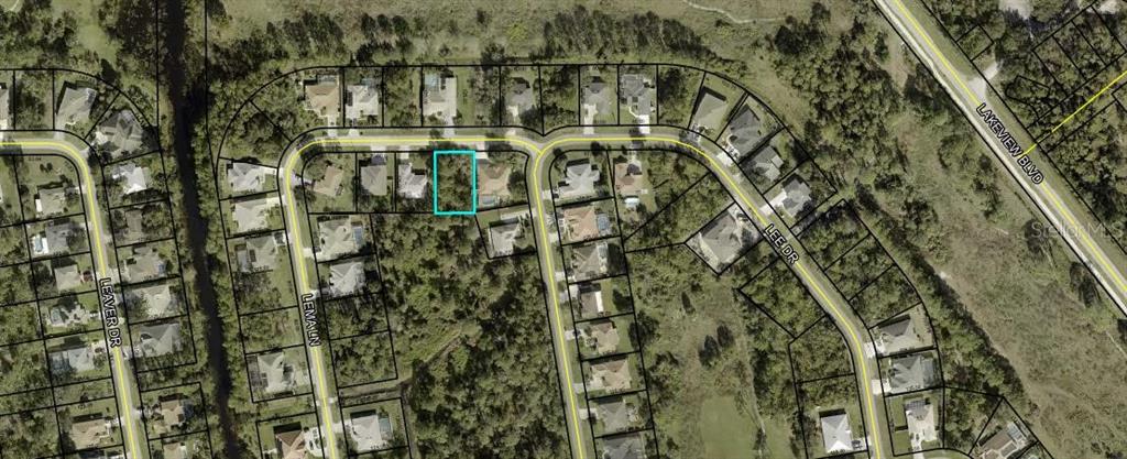 This is an aerial map showing a residential neighborhood with a highlighted vacant lot — 70 LEMA LANE, PALM COAST, FL