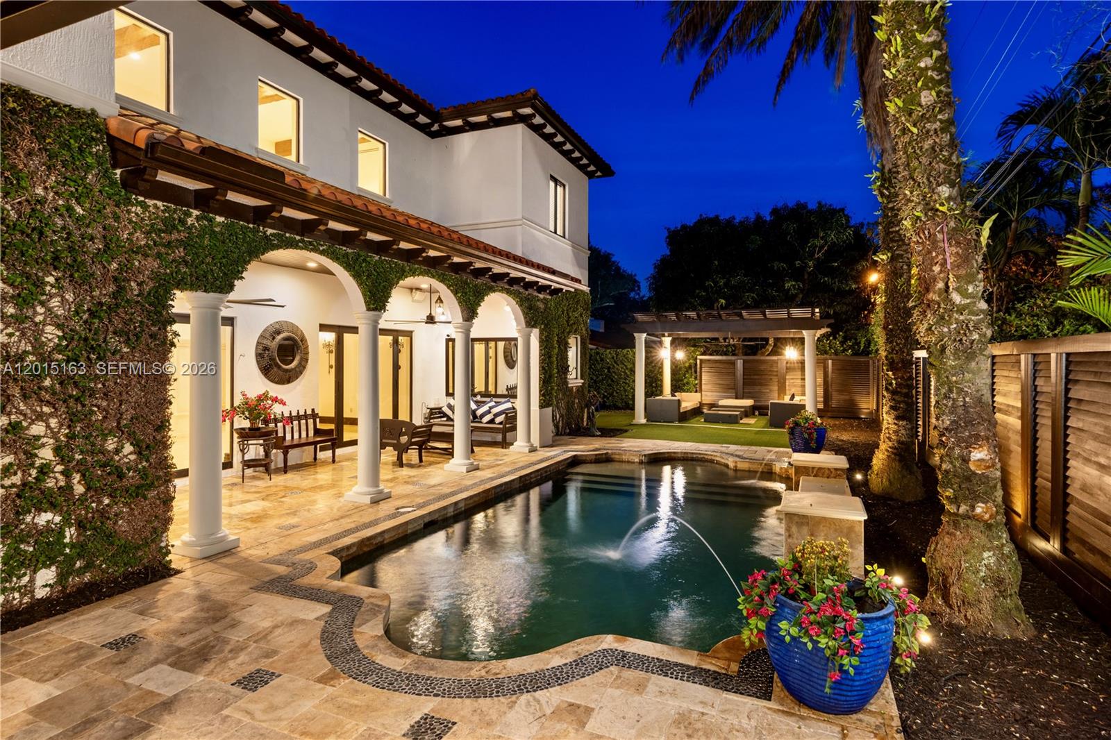 A two-story house with a covered patio, swimming pool, and pergola in the backyard — 5838 SW 50th St, Miami FL 33155, MIAMI, FL