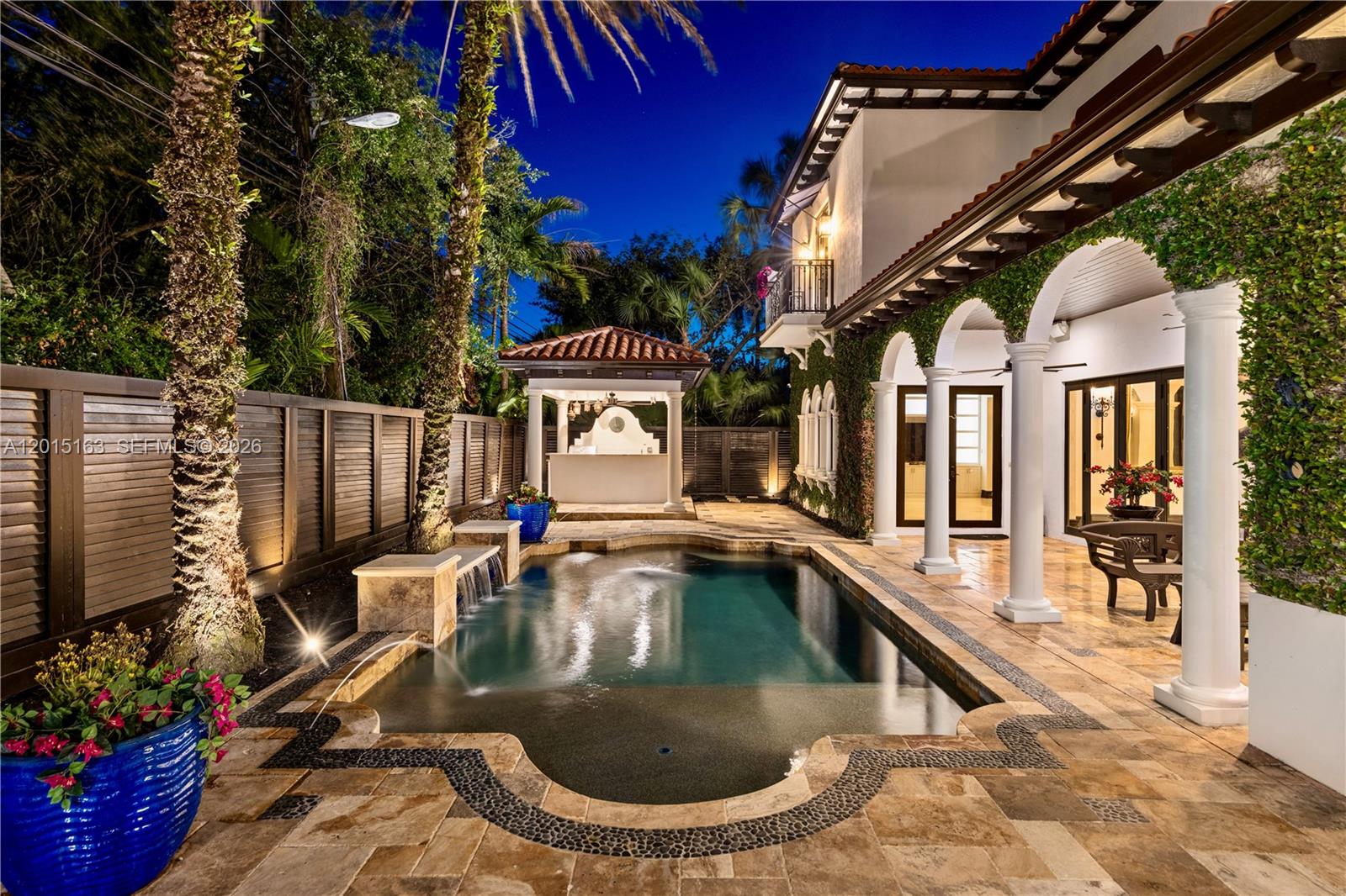 A backyard features a swimming pool with a fountain, a gazebo, and a covered patio — 5838 SW 50th St, Miami FL 33155, MIAMI, FL