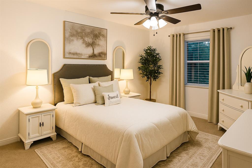 A bedroom features a queen bed, two nightstands with lamps, a dresser, and a ceiling fan — 5120 CHAVES CIRCLE, PORT CHARLOTTE, FL