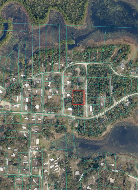 An aerial map shows a rectangular plot of land outlined in red within a wooded neighborhood — 1080 SE 175TH COURT, SILVER SPRINGS, FL