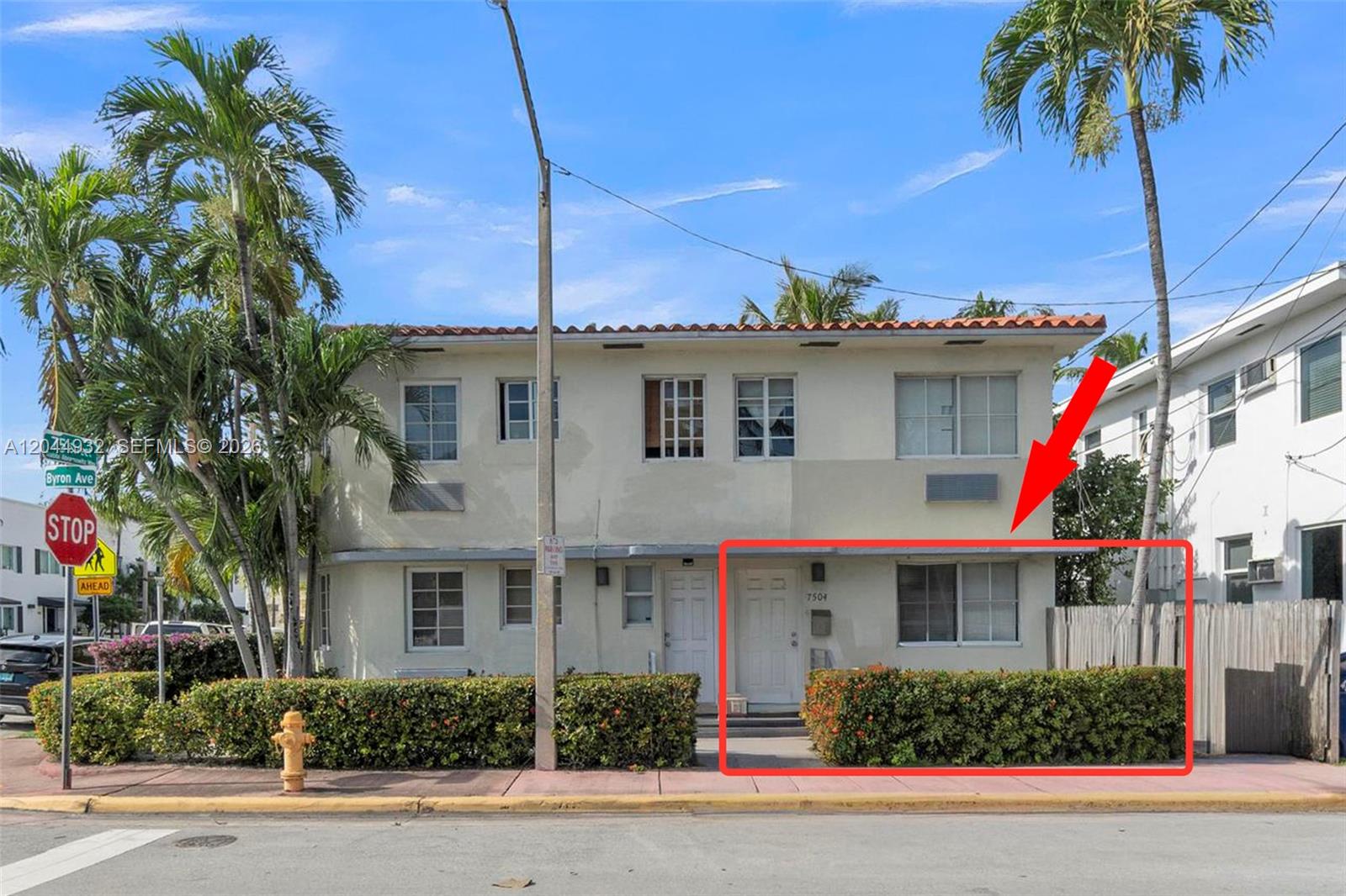 The exterior of a two-story apartment building features a red-outlined ground-floor unit entrance — 503 75th St # 7504, Miami Beach FL 33141, MIAMI BEACH, FL