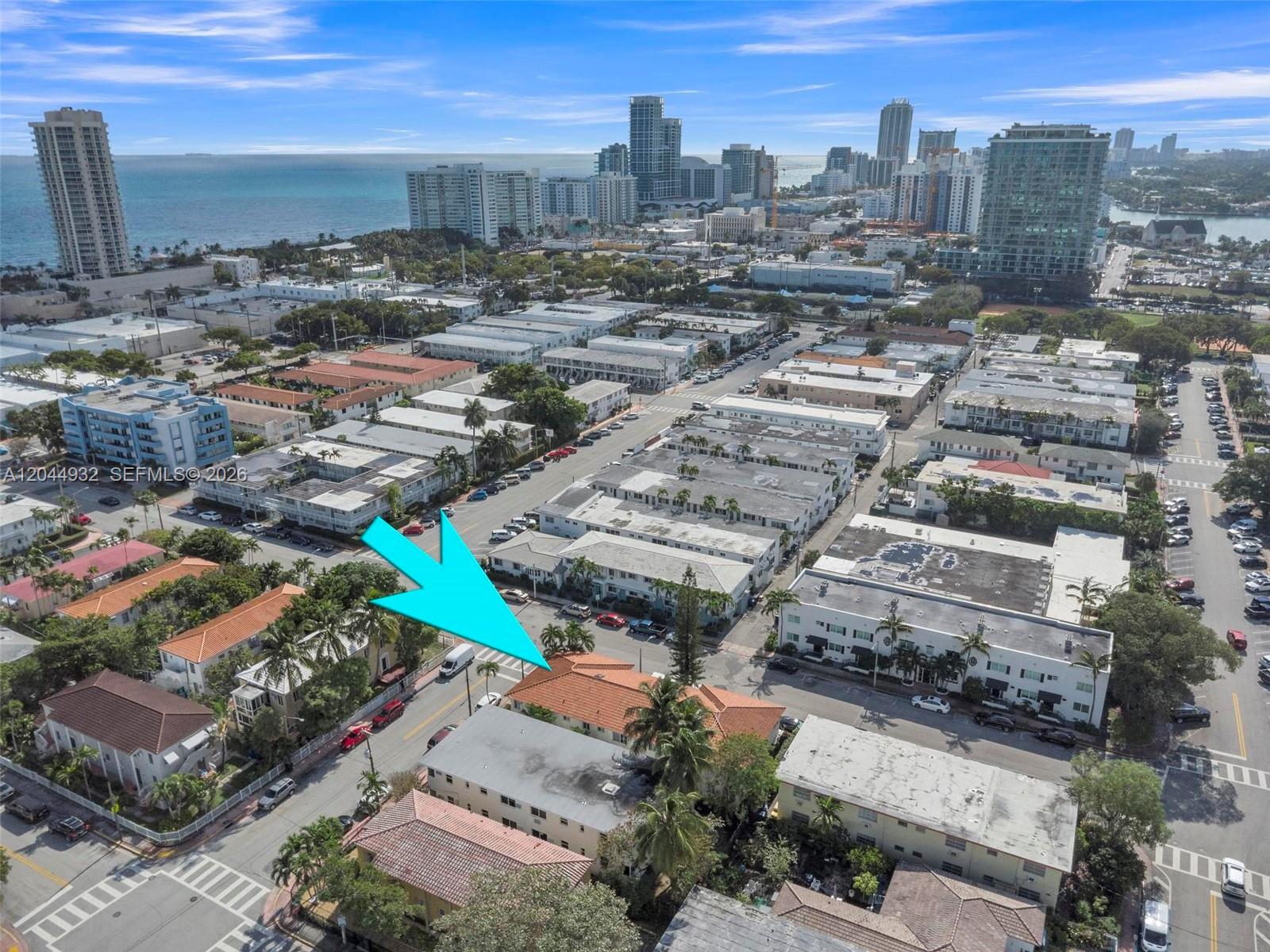 An aerial view shows a low-rise apartment building with a red tile roof — 503 75th St # 7504, Miami Beach FL 33141, MIAMI BEACH, FL