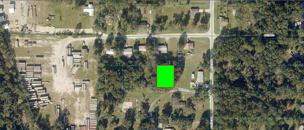 An aerial map view shows a highlighted rectangular parcel of land in a residential area — NW 39TH ROAD, OCALA, FL