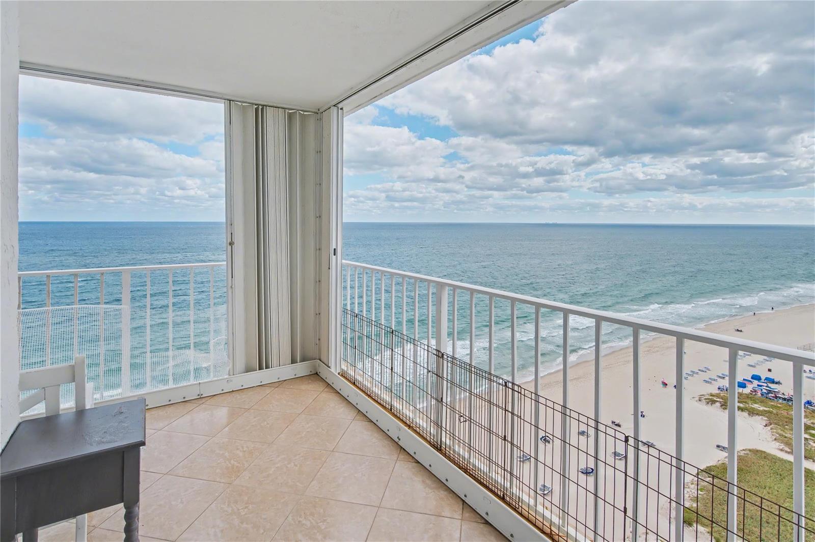 A tiled balcony with a metal railing overlooks the ocean and a sandy beach — 1010 S Ocean Boulevard # 1601, Pompano Beach FL 33062, POMPANO BEACH, FL
