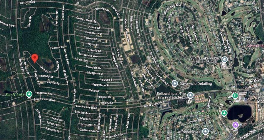 This is a satellite map view of a residential neighborhood in Sun 'N Lake — 8931 OVIEDO STREET, SEBRING, FL